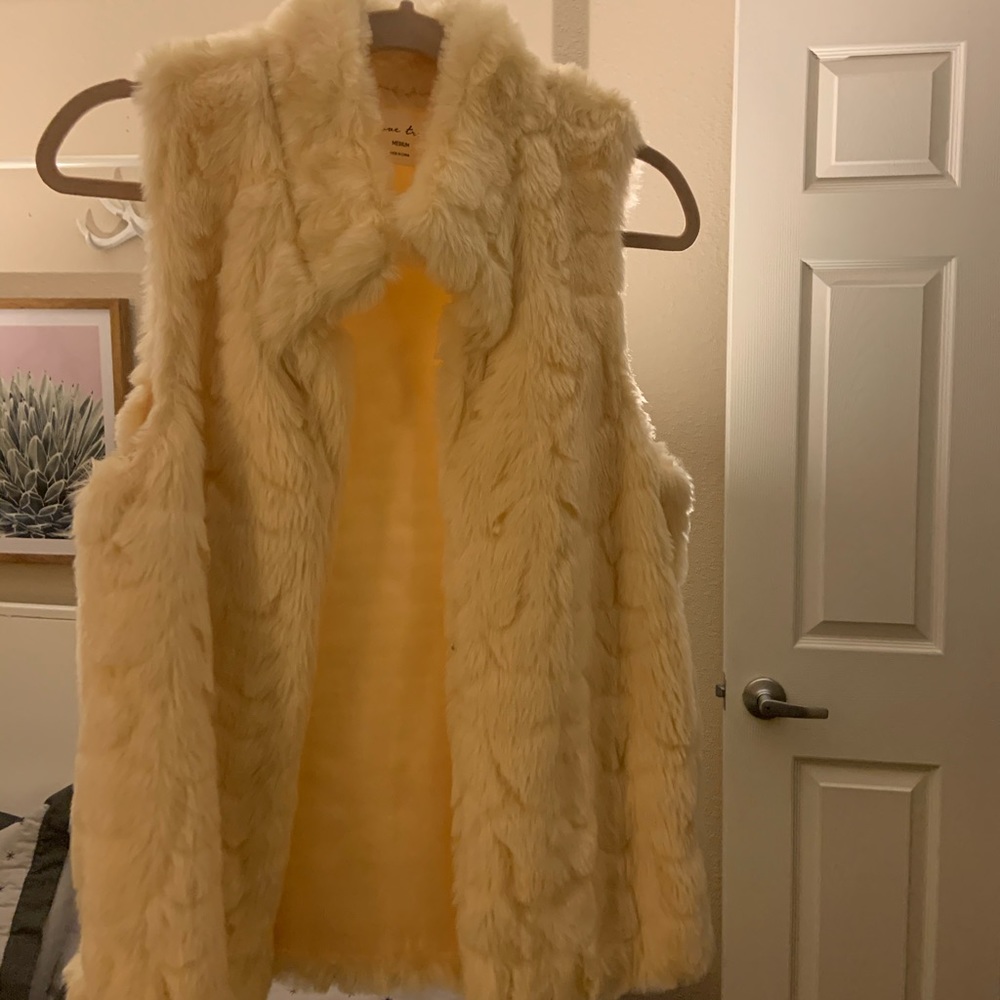 Faux fur vest with side pockets